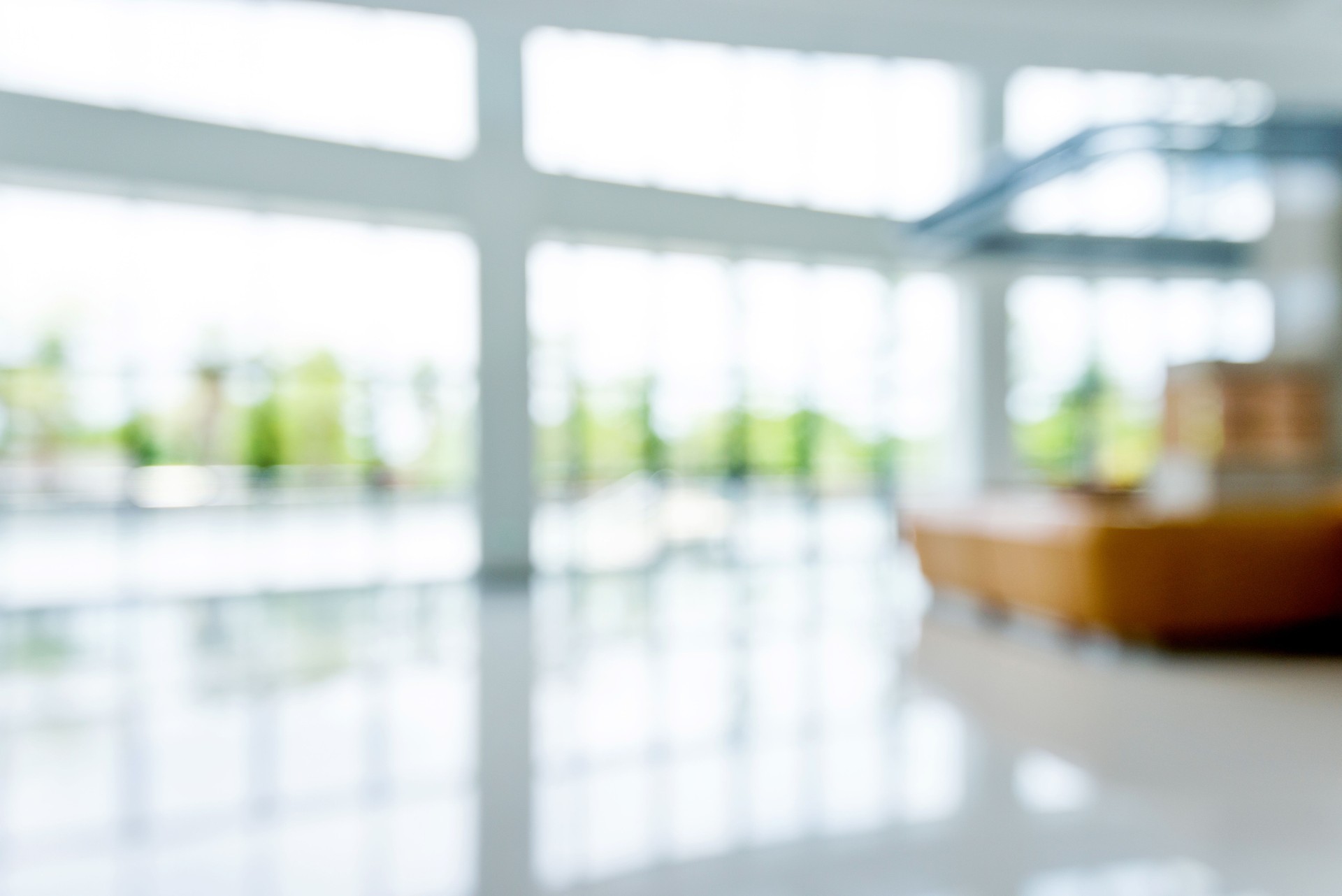 Blur background of reception desk on hospital lobby